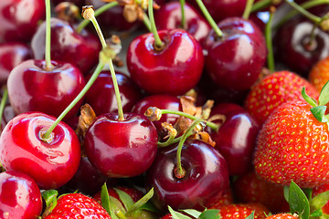 Image showing Strawberries and cherry