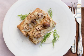 Image showing Salty pancakes with mushrooms