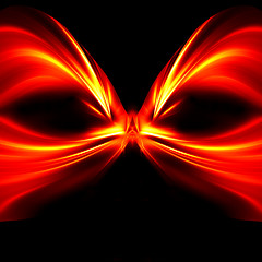 Image showing Abstract mask of red and yellow rays on black