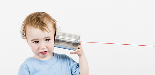 Image showing child with tin can phone