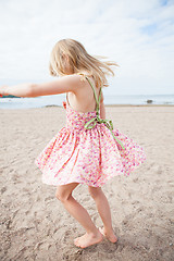 Image showing Young girl having fun at beach