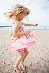 Image showing Young girl having fun at beach