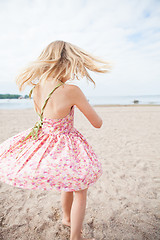 Image showing Young girl having fun at beach