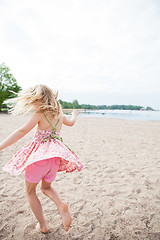 Image showing Young girl having fun at beach