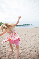 Image showing Young girl having fun at beach