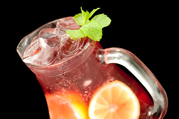 Image showing Fresh lemonade from lemon and berries closeup