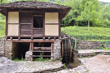 Image showing Water mill and water wheel, called 