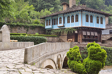 Image showing Old house and a stone bridge in the architectural complex Etara,