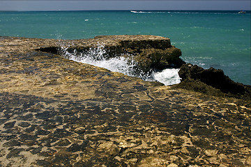 Image showing  sidewalk clouds abstract rock water  