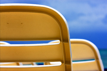 Image showing    plastic chair  in the sky