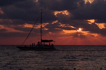 Image showing sailing boat sunset red