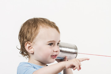 Image showing child with tin can phone