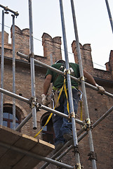 Image showing construction worker on scaffold