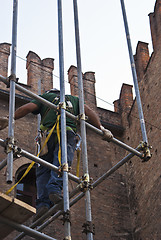 Image showing construction worker on scaffold