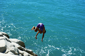 Image showing acrobatic dive from cliff