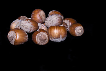 Image showing fresh nuts isolated on a black