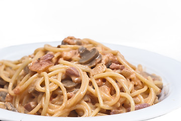 Image showing spaghetti pasta with mushrooms sauce isolated