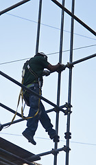 Image showing construction worker on scaffold