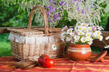 Image showing Summer   still life with flowers and food