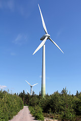 Image showing Wind Turbines against Blue Sky at Summer