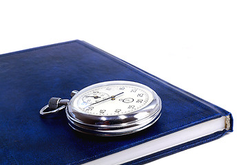Image showing Stopwatch and the notebook on a white background