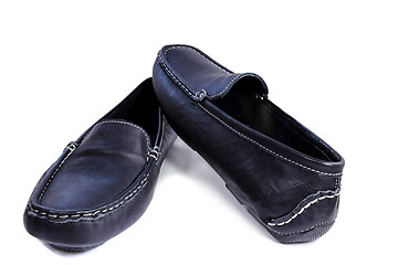 Image showing Black leather loafers on a white background.