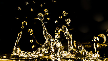 Image showing Golden Water figures