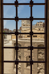 Image showing View of an old church through a window