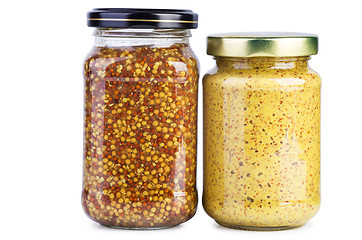 Image showing Glass jars with mustard