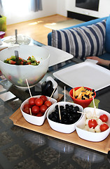 Image showing Mix of salads on the table