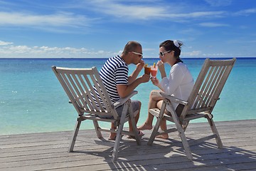 Image showing happy young couple relax and take fresh drink