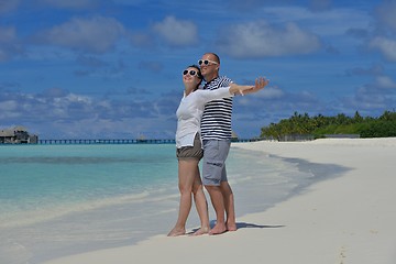 Image showing happy young  couple at summer vacation have fun and relax at bea