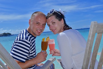 Image showing happy young couple relax and take fresh drink