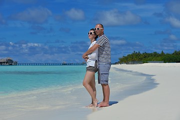 Image showing happy young  couple at summer vacation have fun and relax at bea