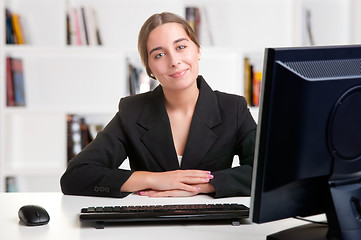 Image showing Businesswoman At Office Desk