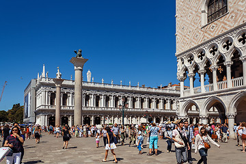 Image showing ITALY, VENICE - JULY 2012: St Marco Square with crowd of tourist on July 16, 2012 in Venice. St Marco Square is the largest and most famous square in Venice.