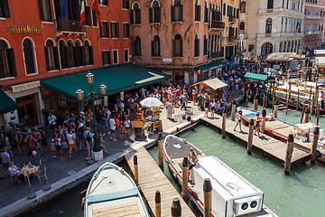 Image showing ITALY, VENICE - JULY 2012: Crowd of tourist near Grand Canal on July 16, 2012 in Venice. More than 20 million tourists come to Venice annually. 