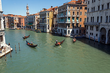 Image showing ITALY, VENICE - JULY 2012 - A lot of traffic on the Grand Canal on July 16, 2012 in Venice. More than 20 million tourists come to Venice annually. 