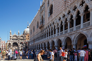 Image showing ITALY, VENICE - JULY 2012: St Marco Square with crowd of tourist on July 16, 2012 in Venice. St Marco Square is the largest and most famous square in Venice.