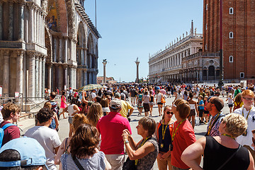 Image showing ITALY, VENICE - JULY 2012: St Marco Square with crowd of tourist on July 16, 2012 in Venice. St Marco Square is the largest and most famous square in Venice.