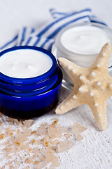 Image showing face cream wiith sea salt and star