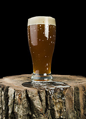 Image showing Beer mug on stump