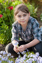 Image showing Girl in garden