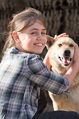 Image showing Girl with dog