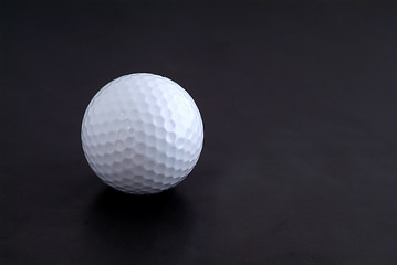 Image showing Golf ball and tee