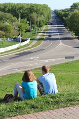 Image showing Pair young enamoured people near the road