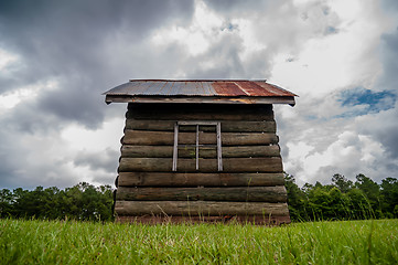 Image showing old wood log cabin in forest