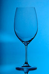 Image showing wineglass on blue