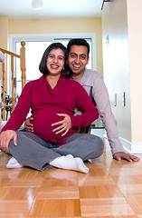 Image showing Happy expectant couple at home