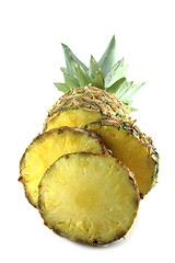 Image showing ripe pineapple with slices